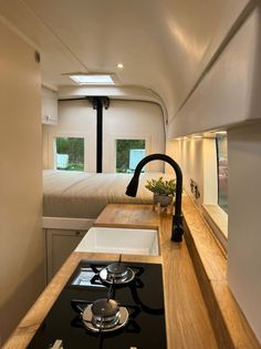 the kitchen is clean and ready to be used as a living area in an rv