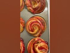 freshly baked pastries on a baking sheet ready to be cooked in the oven,