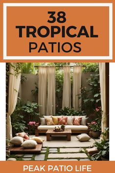 the front cover of an outdoor patio with white and orange pillows on it, surrounded by greenery