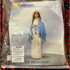 Girls Virgin Mary Costume X- Large New Wt Size: X-Large. 100% Polyester. Dress And Headpiece Are Printed To Look Like Woven Fabric. Headpiece Has Sewn In Elastic For A Secure Fit. Belt Can Be Tied Around The Waist. Dry Cleaned Nw. Now Your Little Girl Can Become The Mother Of God For School Or A Church Play With This Girls Virgin Mary Costume. This Costume Will Make You Look Like Part Of A Nativity Scene. The Gold Trim On The Cape Will Make It Stand Out. Check Out All Of Our Biblical Costumes To Fabric Headpiece, Virgin Mary Costume, Mary Costume, Biblical Costumes, Jester Costume, Medieval Princess, California Costumes, Cat Halloween Costume, Mother Of God