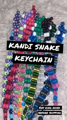 Adopt this adorable little snake buddy! Perfect for raves, gifting, and even stocking stuffers! Kandi Keychain, Pet Wolf, Stocking Stuffers, Beauty Book, Adoption, Etsy Accessories, Accessory Gift, Pet Supplies, Beaded Bracelets