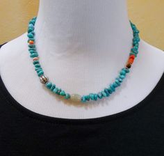 This Native American Spiny Oyster, Turquoise, Quartz, Tiger Eye and silver bead necklace is that signature necklace that you've been searching for. It is handcrafted into a beautiful array of color. This is one of a kind and made just for you! Perfect for dressing up a tee shirt and jeans wardrobe! 18 7/8" Cannot be adjusted Weight: 36 grams Cheap Handmade Turquoise Beaded Necklaces, Turquoise Bead Necklaces Novica, Cheap Southwestern Beaded Turquoise Necklace, Cheap Beaded Turquoise Necklace, Artisan Turquoise Necklace With Colorful Beads, One-of-a-kind Blue Turquoise Spiritual Necklace, Spiritual Blue One-of-a-kind Turquoise Necklace, Unique Hand-strung Turquoise Beaded Necklace, Artisan Hand-strung Turquoise Necklace Gift