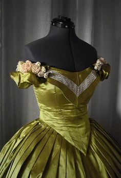 Vintage Green Dress With Historical Design, Green Vintage Dress With Historical Design, Elegant Ball Gown For Theater, Historical Ball Gown Dresses For Theater, Historical Ball Gown For Theater, Elegant Baroque Victorian Dress For Theater, Elegant Victorian Dress For Theater With Baroque Style, Elegant Dress With Fitted Bodice For Theater, Victorian Fitted Dress For Debutante Ball