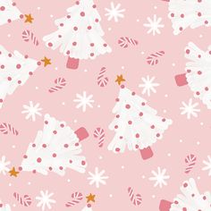 a pink background with white christmas trees and candy canes