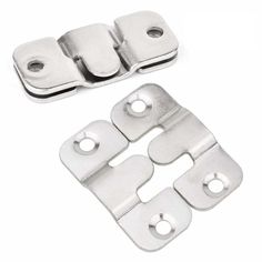 pair of stainless steel door hinges on white background