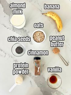 the ingredients to make an oatmeal smoothie laid out on a marble counter top