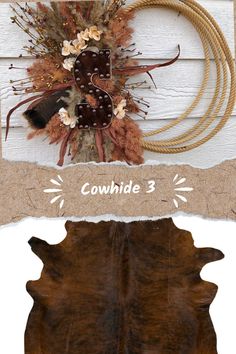 the cowhide rug has been made into a decorative decoration with flowers and leaves on it