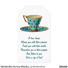 a blue tea cup with gold trimmings and a poem on the bottom that says,