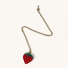 Delight in the sweetness of our Strawberry Necklace! This delectable addition to your jewellery collection features a strawberry pendant crafted with layers of laser-cut metallic gold Perspex, vibrant red, and green marbled acrylic. It's a burst of fruity fun that adds a playful touch to your style. The strawberry pendant comes with either a sterling silver or gold filled chain. The necklace is meticulously handcrafted in our London studio and will come thoughtfully packaged in a logo box, making them the perfect gift for someone special or a sweet treat for yourself! Strawberry Necklace, Strawberry Charm, Box Making, Gold Filled Chain, Sweet Treat, Jewellery Collection, Sterling Silver Chain, Metallic Gold, A Logo