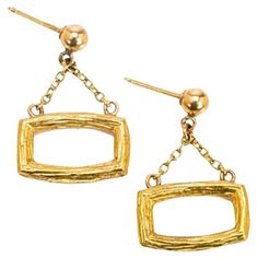 Vintage Bucherer 5.4 Grams 18K Yellow Gold Brushed Finish Dangle Earrings Details: Item Type: Dangle Earrings Metal: 18K Yellow Gold Weight: 5.4 Grams Measurements: 9.8 x 15.8 mm Immerse yourself in timeless elegance with these vintage Bucherer 18K yellow gold dangle earrings. Featuring a brushed gold texture and geometric design, these earrings exude mid-century modern sophistication. Each earring is beautifully crafted with a lightweight yet sturdy feel, perfect for adding understated luxury t Gold Dangle Earrings, Earrings Metal, Understated Luxury, Gold Diamond Earrings, Charm Making, Modern Earrings, Gold Earrings Dangle, Gold Texture, Love Ring