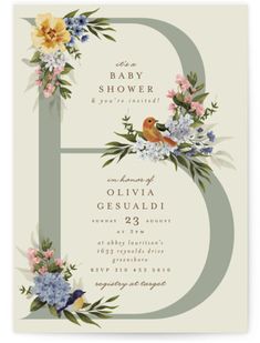 the floral letter e baby shower is shown with flowers and leaves on it's sides