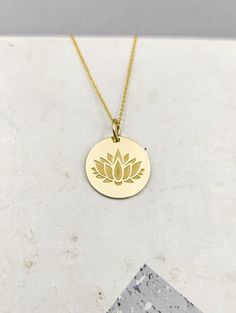 All parcels are shipped in one business day! For a speedy delivery to your address please select the upgraded shipping with a small extra cost. Engraved Lotus Design Necklace - Flower Pendant Necklace - Handmade Lotus Gold Jewelry - Engraved Flower Gold Necklace Engraved Lotus Pendant Necklace made out of 14K Solid Gold. Available only in Yellow Gold finish. An elegant piece of jewelry that is a perfect gift to yourself and your loved ones. Charm Thickness: 0.5mm Jump Ring inner diameter: 4mm Ad Lotus Flower Jewelry, Flower Necklace Gold, Lotus Flower Necklace, Engraved Flower, Yoga Necklace, Lotus Pendant, Gold Lotus, Solid Gold Necklace, Jewelry Care Instructions