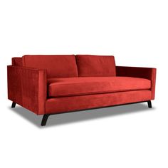 a red couch sitting on top of a white floor