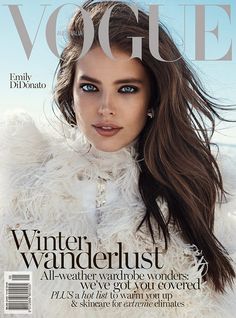 a woman with long hair on the cover of a magazine, wearing a fur coat