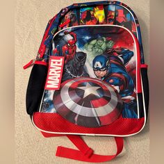 Kids Marvel Univers Avengers Boy's 17" Backpack . This Backpack Features One Main Compartment And A Front Accessory Pocket With Zipper Closures For Organization. It Has Padded And Adjustable Shoulder Straps, A Top Locker Loop Handle And Two Side Pockets To Store Water Bottle, Umbrella, Or Other Items. The Adjustable Shoulder Straps Include Reflective Strips For Nighttime Visibility. This School Bag Is Perfect For Everyday Use Or A Fun Sleepover. Exterior Dimensions: 17" X 12" X 5" Interior Compa Small Accessories, School Bag, Kids Bags, Laptop Sleeve, Laptop Sleeves, Kids Accessories, Kids Boys, Backpack Bags, Shoulder Straps