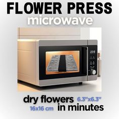 a microwave oven with the words flower press microwave dry flowers 5 3 / 8'' x5 3 / 8'' in minutes