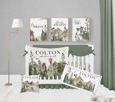 a baby crib bedding set with bear, deer and pine trees on it