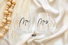 two glass mugs with the words mr and mrs on them