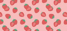 a pink background with strawberries on it