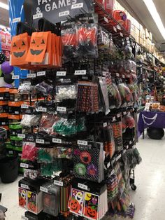 there are many halloween items on display in the store