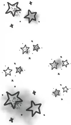 some black and white stars flying in the air with one star falling off it's side