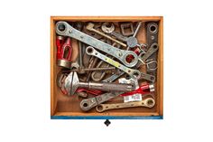 a box filled with lots of different types of wrenches and pliers in it