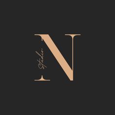 the letter n is inscribed in cursive handwriting with an elegant monogramic style