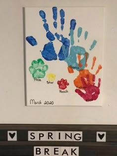 a handprint is displayed in front of a crossword puzzle with the words spring break on it