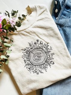 Embroidered Wild Bloom T-Shirt on a Cream Comfort Colors Tee ( 100% Cotton) Plant T Shirt Designs, Shirt Stitching Ideas For Women, Nature T-shirt, Embroidering On Clothes, Unique Tshirt Designs Creative, Nature T Shirt, Nature Graphic Tees, Unique Graphic Tees, Women’s Graphic Tees