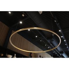 a circular light fixture hanging from the ceiling