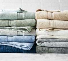 several folded towels stacked on top of each other