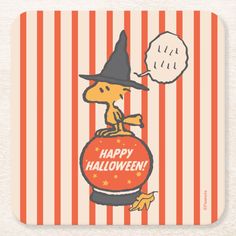 a cartoon dog wearing a witches hat on top of a ball with the words happy halloween