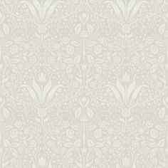 a white wallpaper with floral designs on it