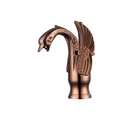 a faucet shaped like an eagle with wings on it's head and body