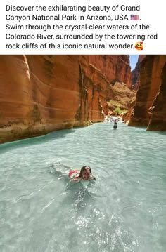 a woman swimming in the middle of a river surrounded by red rocks and canyons