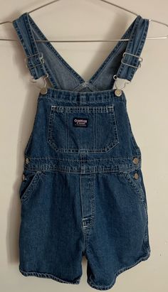 Vintage Bib Front Shortalls With Pockets, Vintage Medium Wash Overalls, Vintage Denim Shortalls With Bib Front, Vintage Denim Bib Front Shortalls, Vintage Denim Blue Bib Front Overalls, Vintage Cotton Medium Wash Shortalls, Vintage Denim Shortalls In Medium Wash, Vintage Style Medium Wash Denim Shortalls, Vintage Medium Wash Denim Shortalls