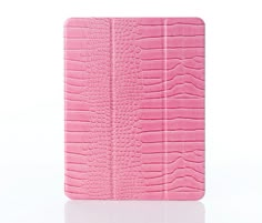 an ipad case with pink crocodile skin