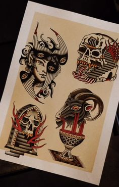 an image of tattoos on paper with skulls