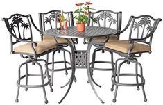 an outdoor table with four chairs and a potted plant on the top, against a white background