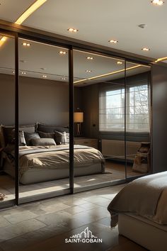 a bedroom with mirrored walls and lights on the ceiling