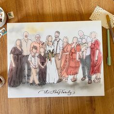 a watercolor drawing of people standing together on a wooden table next to scissors and tape