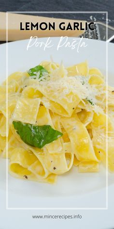 lemon garlic pasta with basil on a white plate