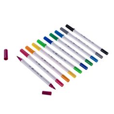 six different colored pens are lined up next to each other