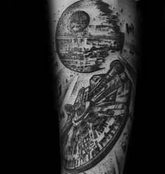 a man's arm with a black and white tattoo on it that has a spaceship in