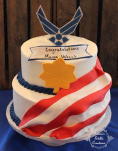 a white cake with red, white and blue frosting