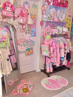 a child's clothing store with hello kitty decorations on the walls and flooring