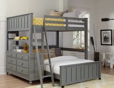 a gray bunk bed sitting next to a white dresser