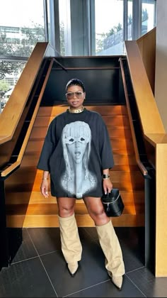 Oversized Graphic Tee Outfits Black Women, Concert Fashion Baddie, 2025 Birthday Outfits, T Shirt And Boots Outfit Women, Winery Date Outfit Fall, Big Shirt Outfits Women, Layer T Shirt Outfit, Big Tee Shirt Outfits Black Women, Essential Pieces Of Clothing Woman