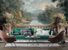 a living room with a green couch and two chairs in front of a painting on the wall