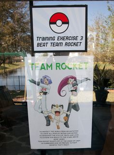 there is a sign in the window that says, training exercise 3 beat team rocket